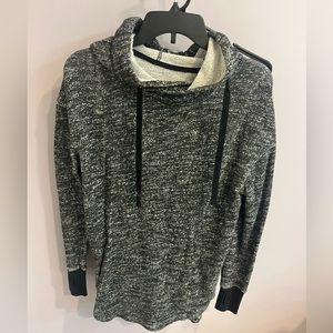 Gray hoodie. Thumb holes.